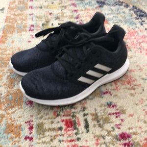 Black and grey Adidas shoes